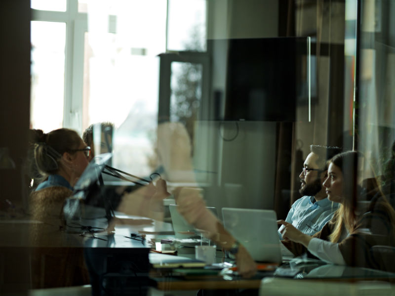 office setting with team members discussing